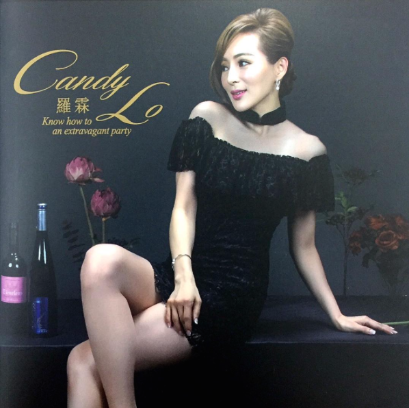 Candy Lo looks beautiful and elegant in our trendy black lace off-shoulder modern Qipao in Goodpoint Magazine
